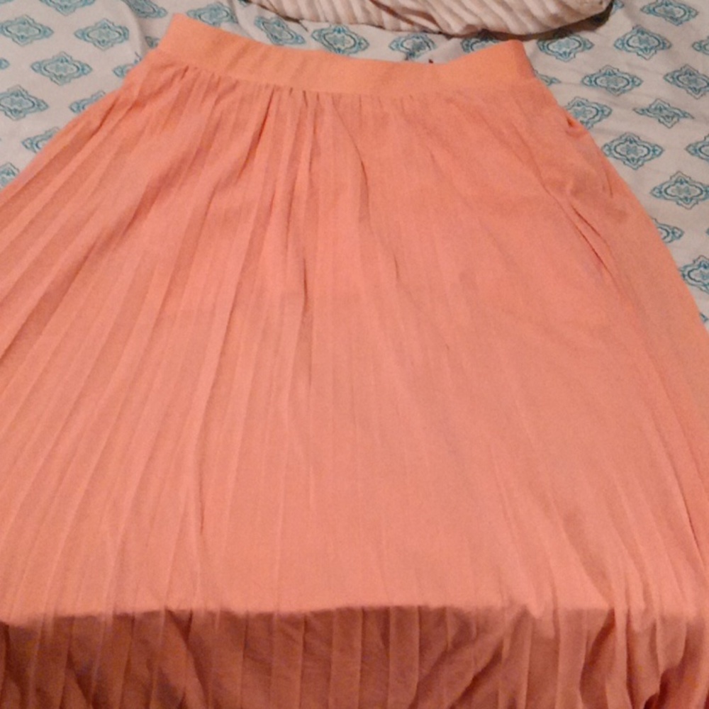 It's a pinkish long skirt.